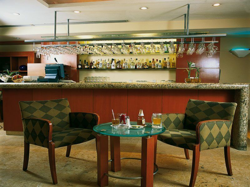 Eurostars Zona Rosa Suites Meksyk Zewnętrze zdjęcie A bar in a hotel